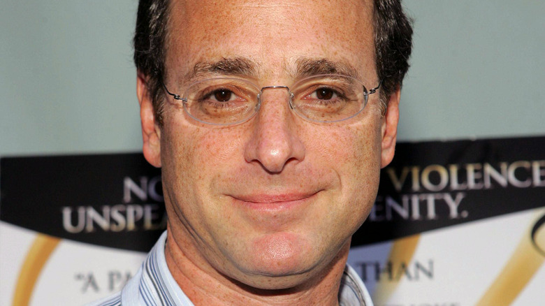 Bob Saget posing in glasses