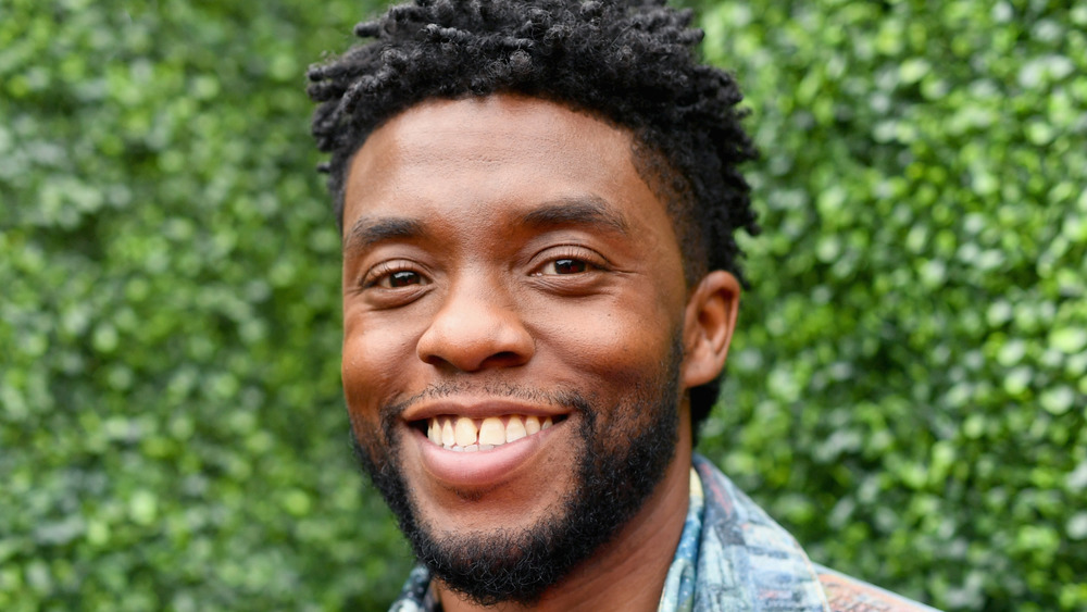 Chadwick Boseman smiles