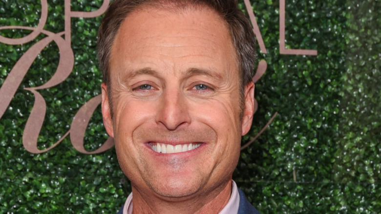 Chris Harrison posing at event