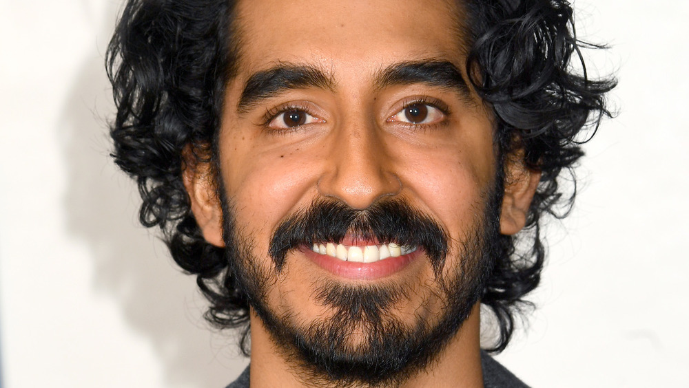 Dev Patel smiling