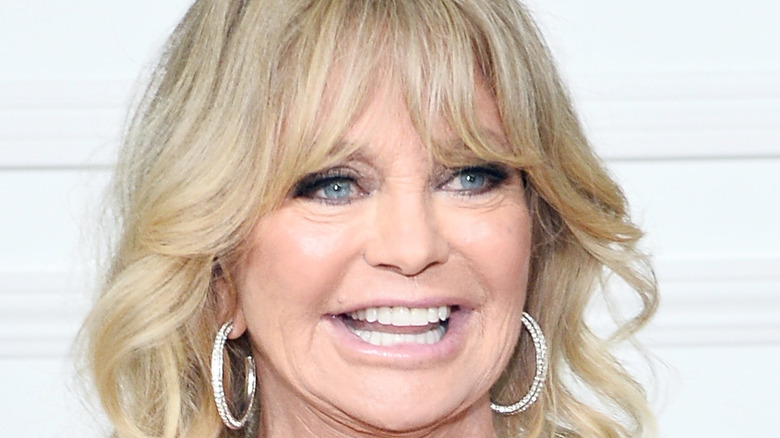 Goldie Hawn smiles at an event