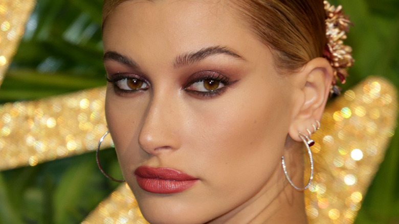 Hailey Bieber smoldering stare on red carpet