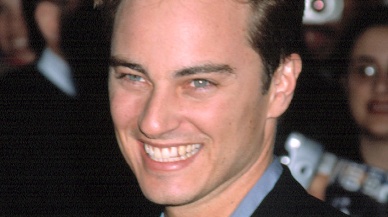 Kerr Smith smiling big in 2002