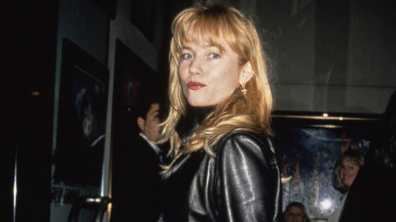 Rebecca De Mornay wearing a leather jacket