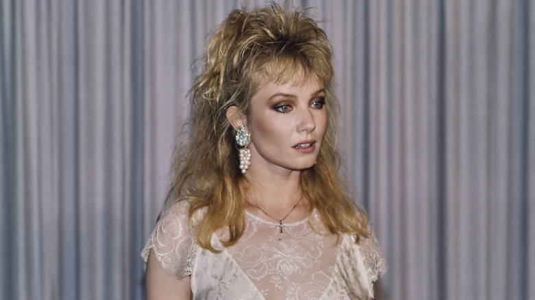 Rebecca De Mornay posing at an event