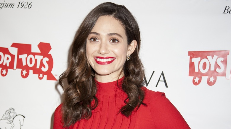 Emmy Rossum attends a toys for tots fundraiser