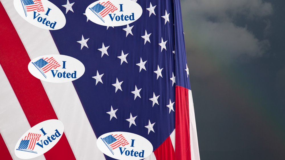 American flag covered in "I voted" stickers