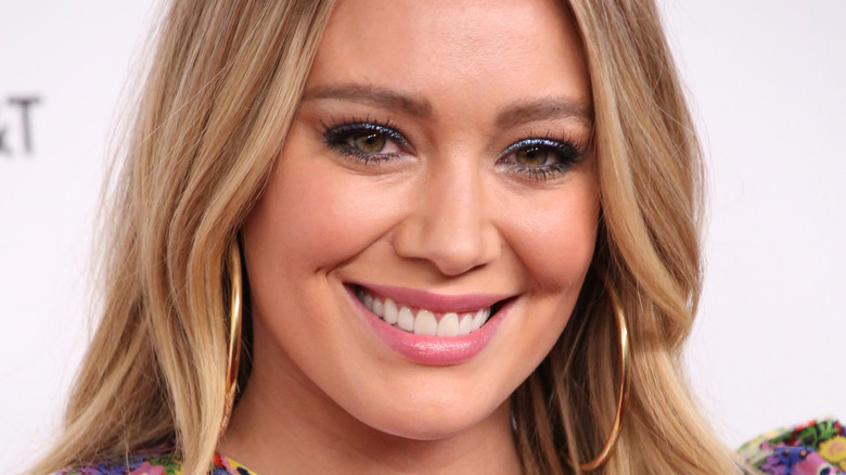 Hilary Duff smiling at event