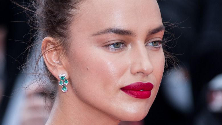 Irina Shayk wearing red lipstick