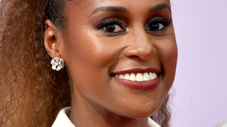 Issa Rae smiling at camera