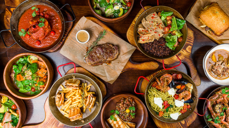 A dinner table with different plates