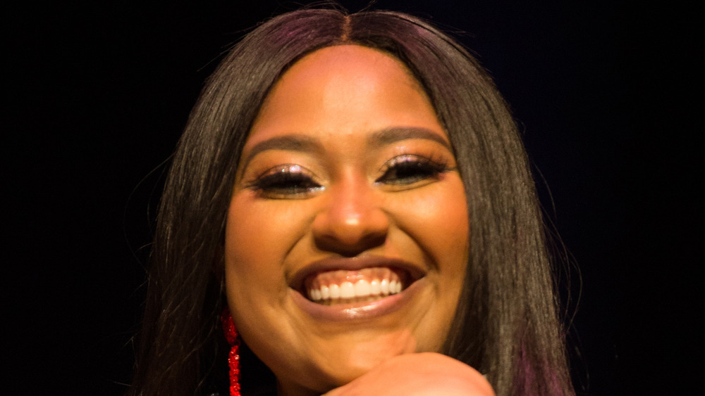 Jazmine Sullivan smiling at an event