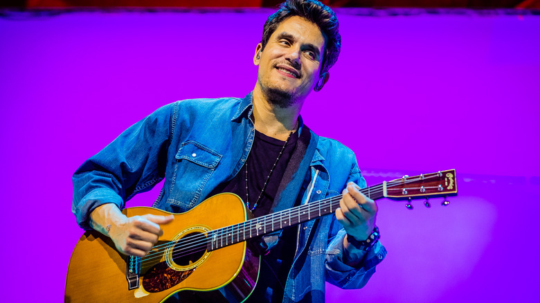 John Mayer playing guitar