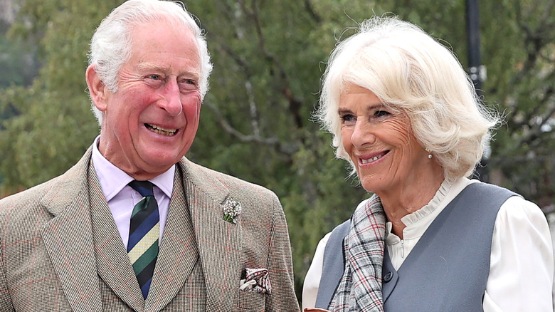 Charles and Camilla laugh