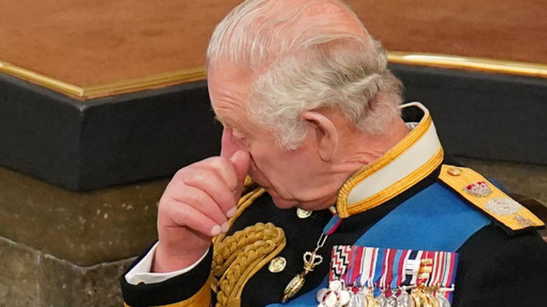 King Charles sheds tears