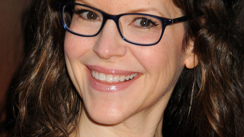 Lisa Loeb smiles at camera