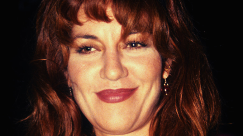 Katey Sagal smiling at nightclub in 90s