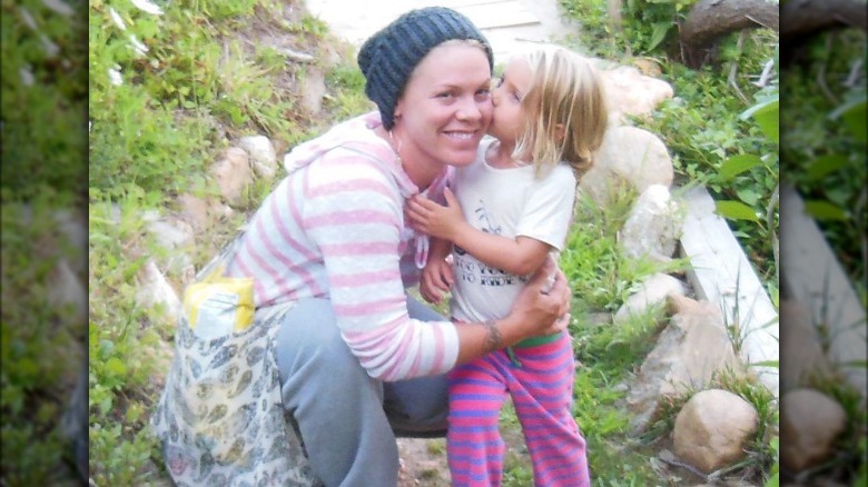 Pink with no makeup hugging daughter Willow