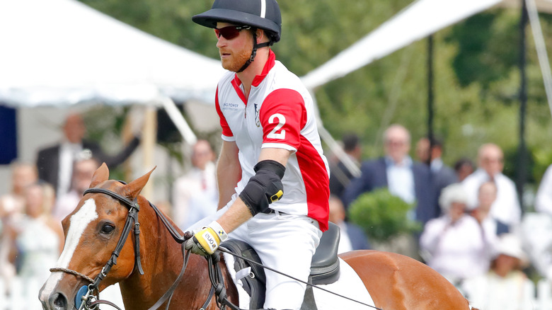Prince Harry playing polo