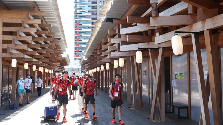 Athletes wearing red in Tokyo Olympic Village 