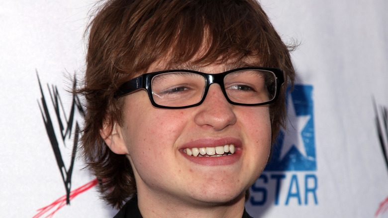 Angus T. Jones smiling