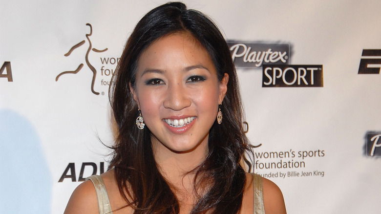 Michelle Kwan smiling on step-and-repeat in 2007