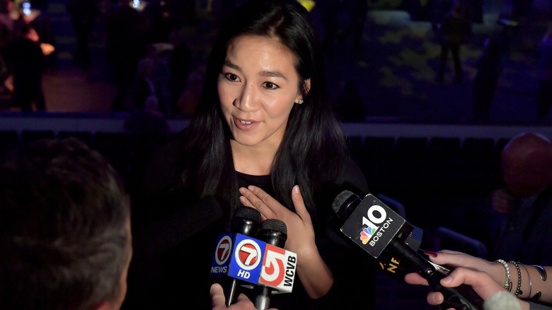 Michelle Kwan giving an interview