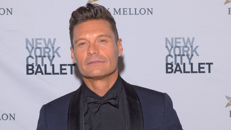 Ryan Seacrest poses at the New York City Ballet red carpet