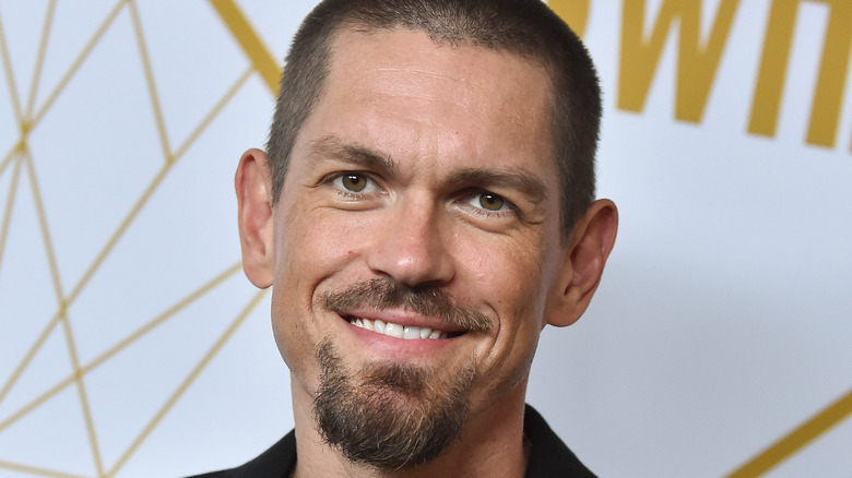 Steve Howey smiling