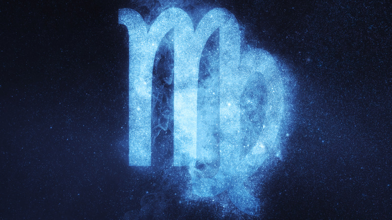 Virgo sign against starry night background