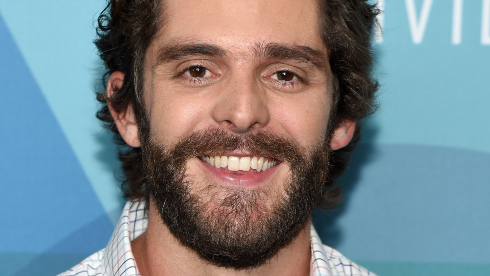 Thomas Rhett smiling