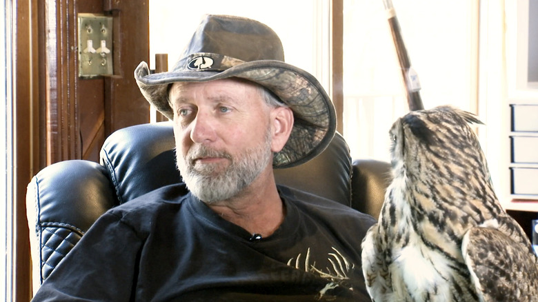 Tim Stark holding an owl