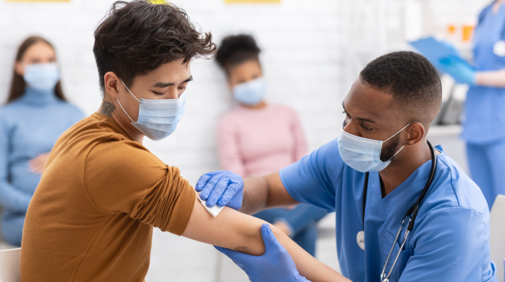 man gets vaccine