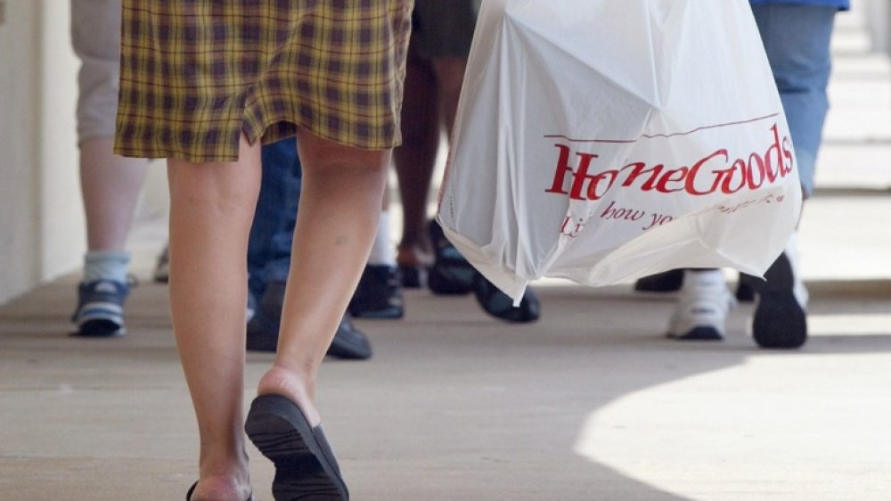 Woman carrying a HomeGoods bag