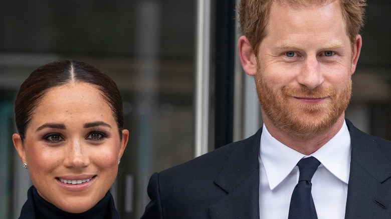 Prince Harry and Meghan Markle smiling