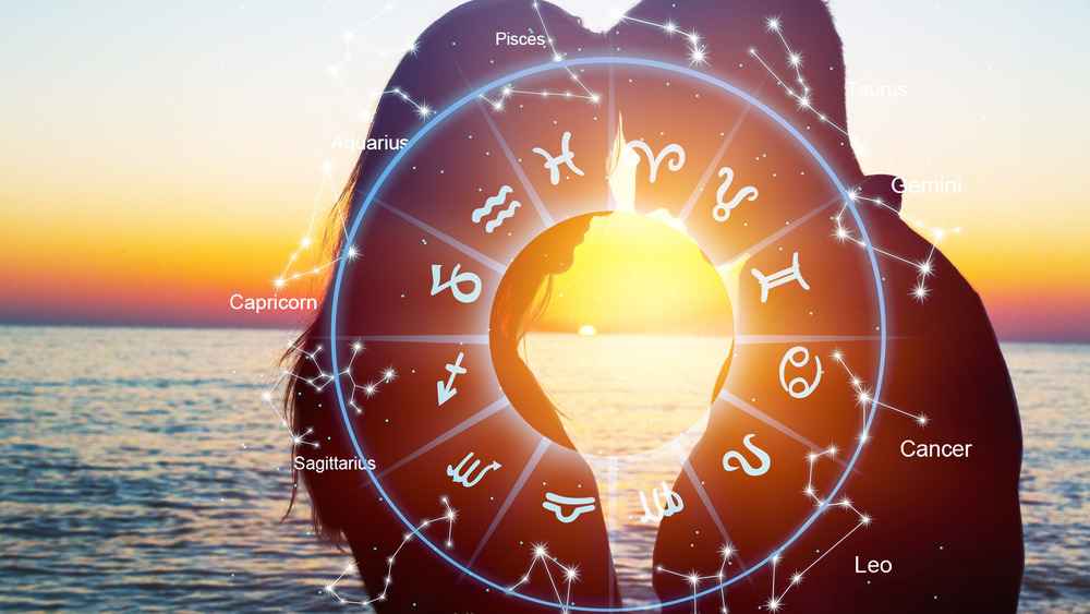 Couple at the beach and an astrology chart 