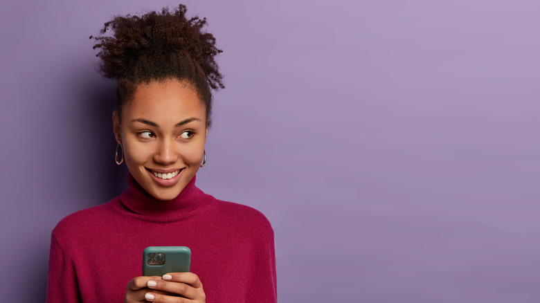 Woman texting on phone