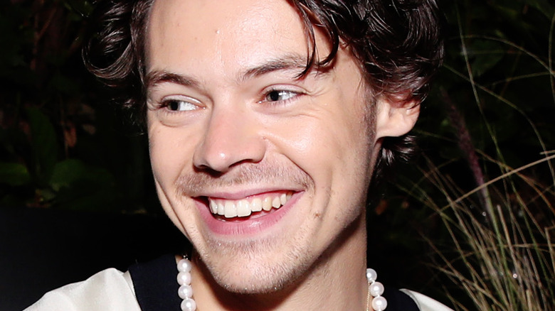 Harry Styles laughing at Spotify event