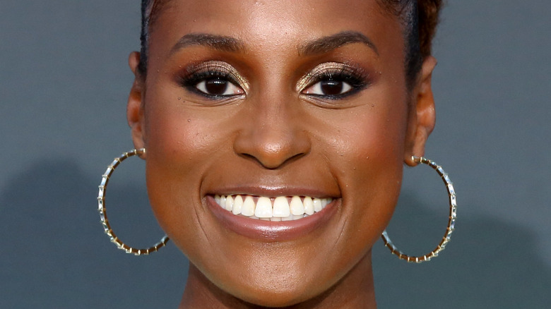 Issa Rae smiles on the red carpet
