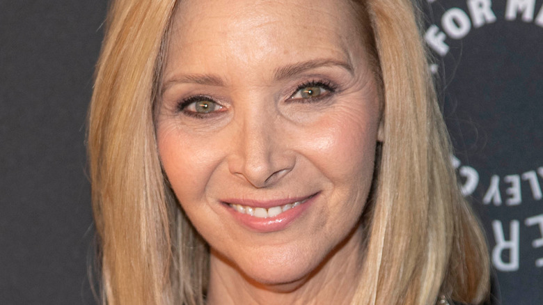 Lisa Kudrow smiling at event