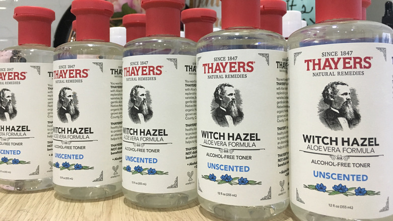 bottles of witch hazel on store shelf