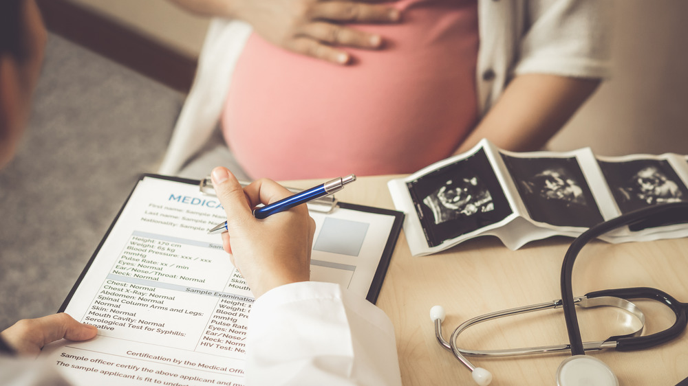 Pregnant woman at doctors appointment