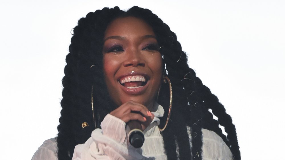 Singer Brandy wears her hair in Marley twists