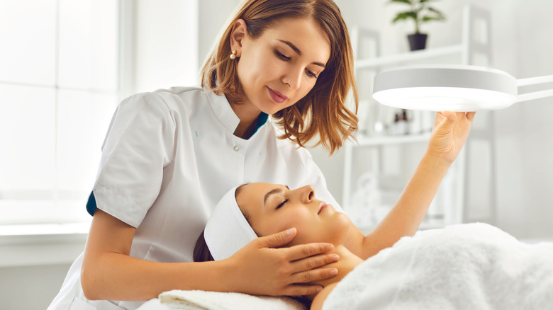 A woman getting a facial 