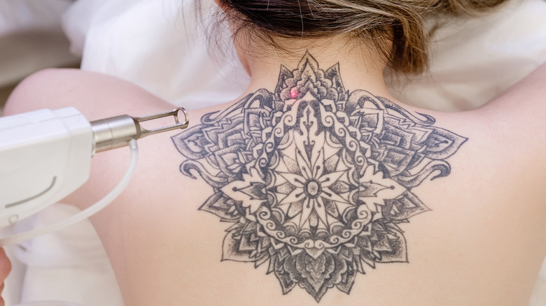 These Tattoo Artists Reveal What You Need To Know Before You First