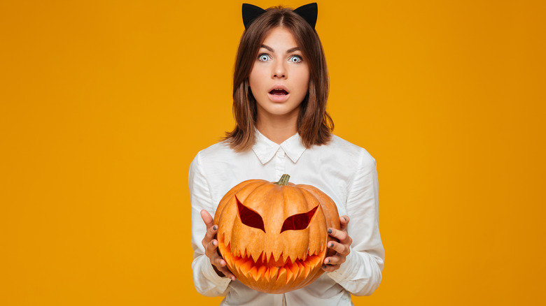 Woman dressed as a cat.