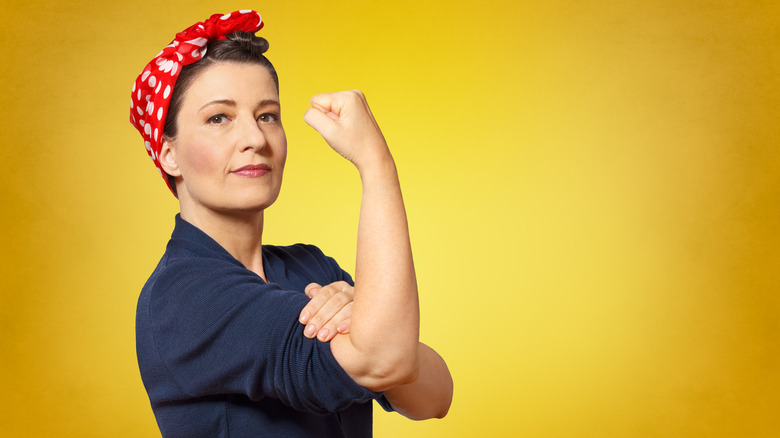 Woman in Rosie the Riveter costume