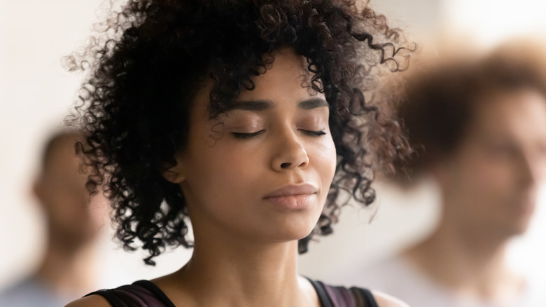 Black woman meditating