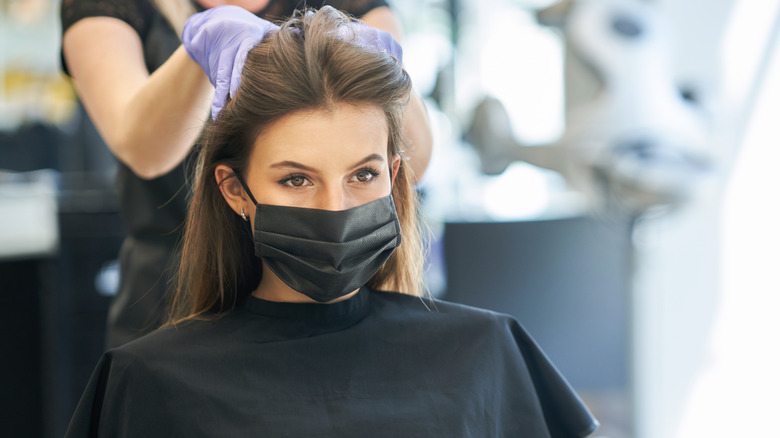 Woman getting a haircut