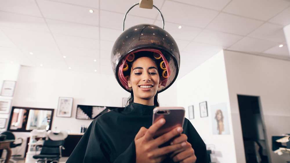 Girl sitting at a hair salon